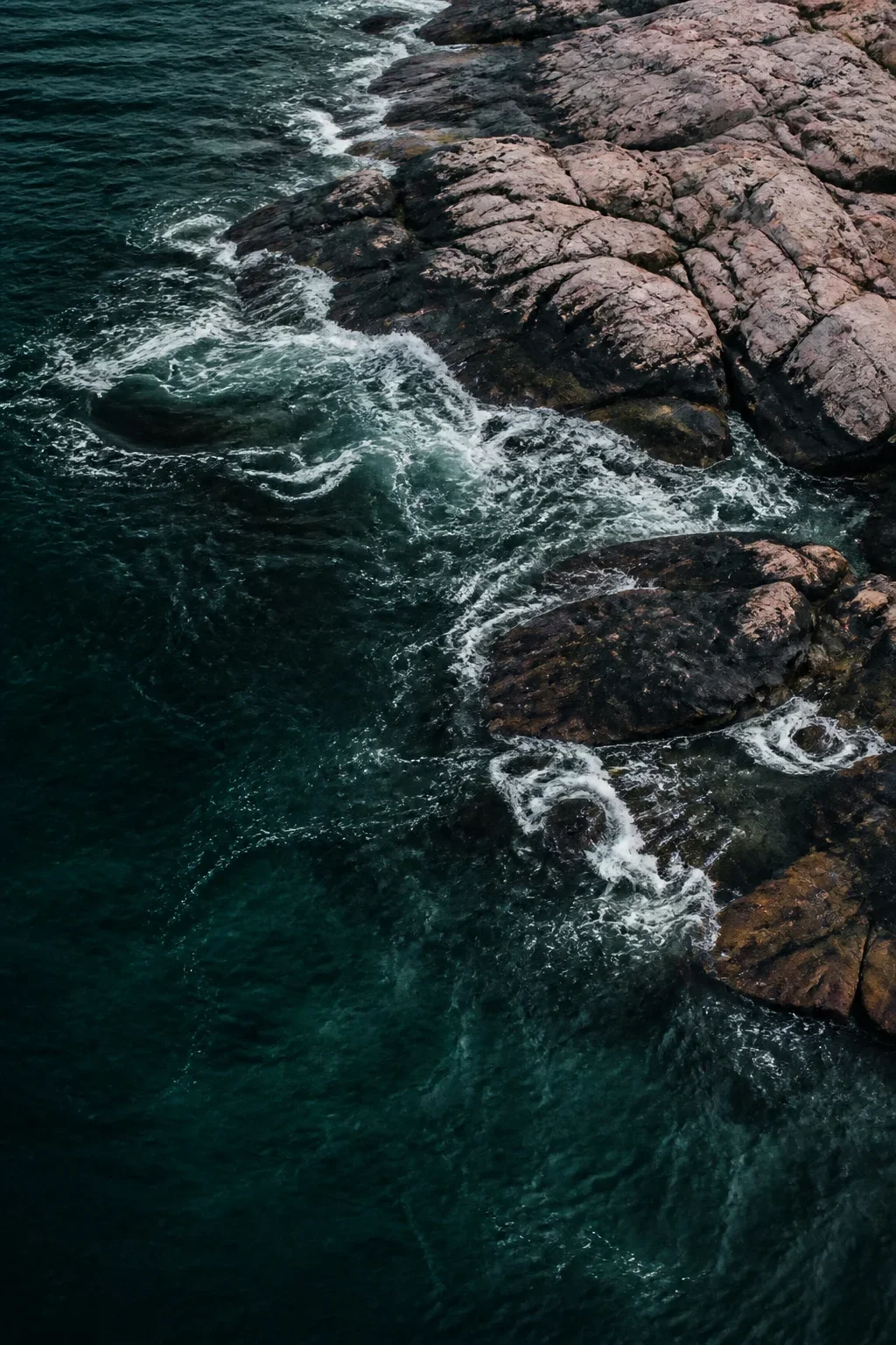 Ocean water moving through a rocky shoreline