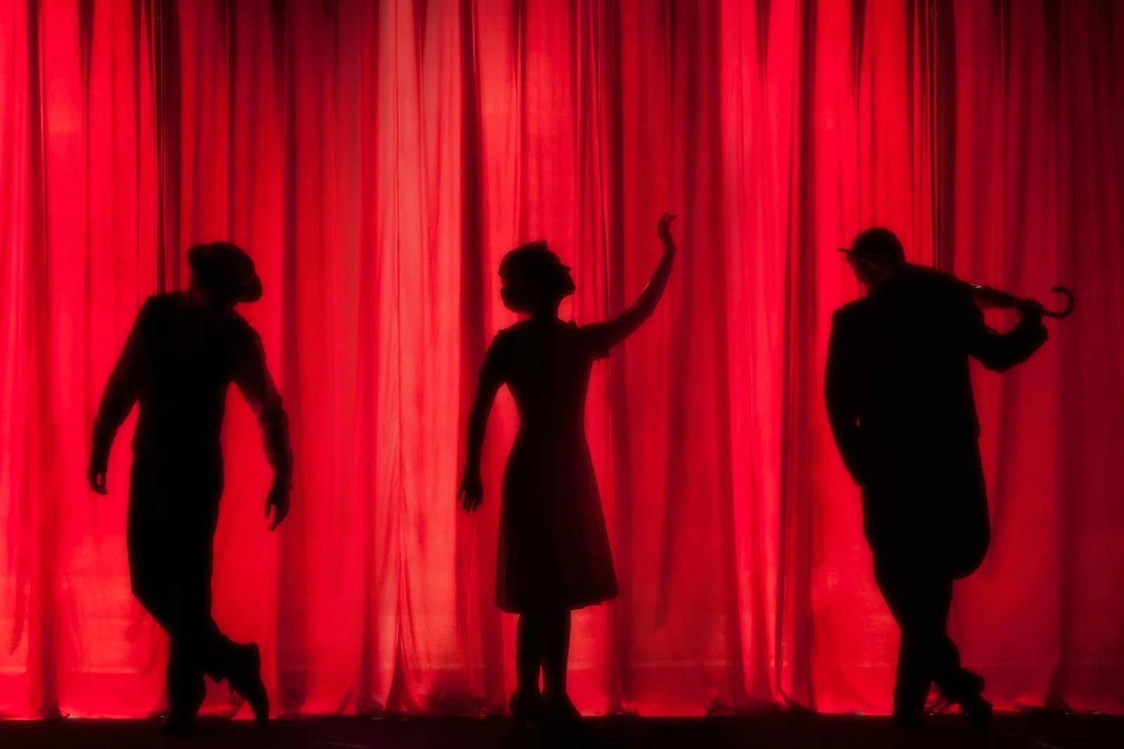 Theater stage illuminated during a performance